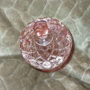 Pink glass jar engraved with diamond shaped